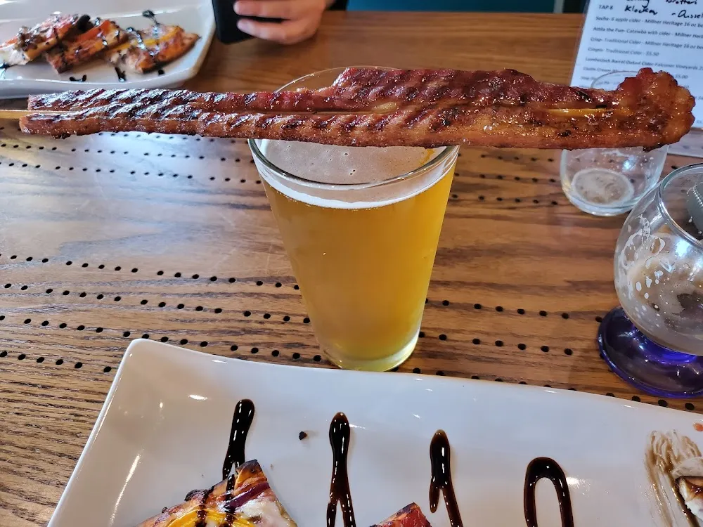 Bacon on a Stick with a Castle Danger Cream Brew